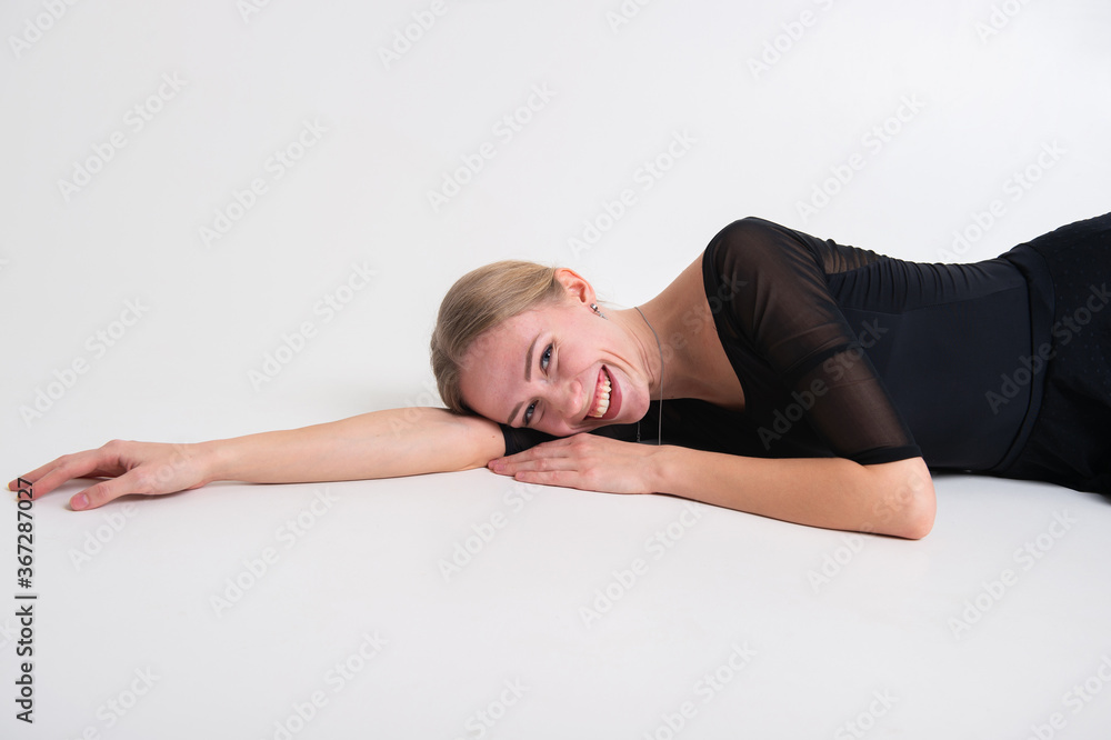Beautiful flexible girl gymnast over white background Beautiful flexible girl gymnast over white background