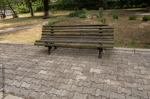 Old wooden bench located in the courtyard of the memorial house of Poni Cernatescu