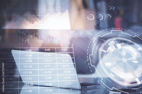 Forex Chart hologram on table with computer background. Double exposure. Concept of financial markets.