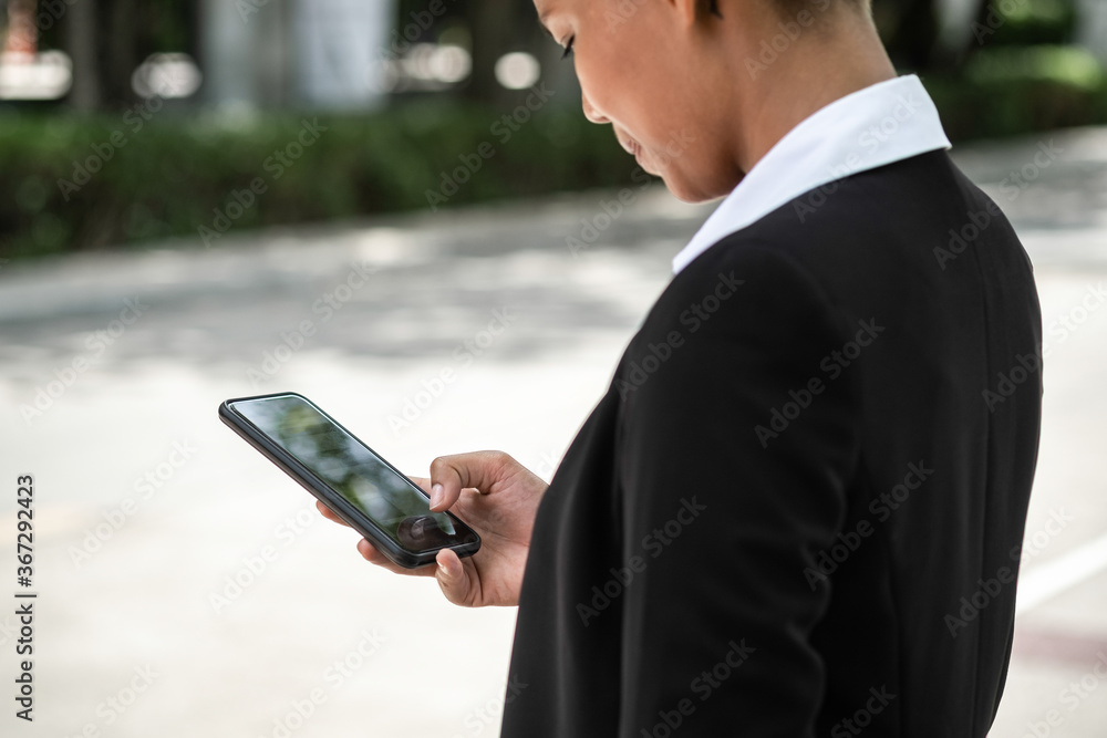 Fototapeta premium Business woman using phone stock photo
