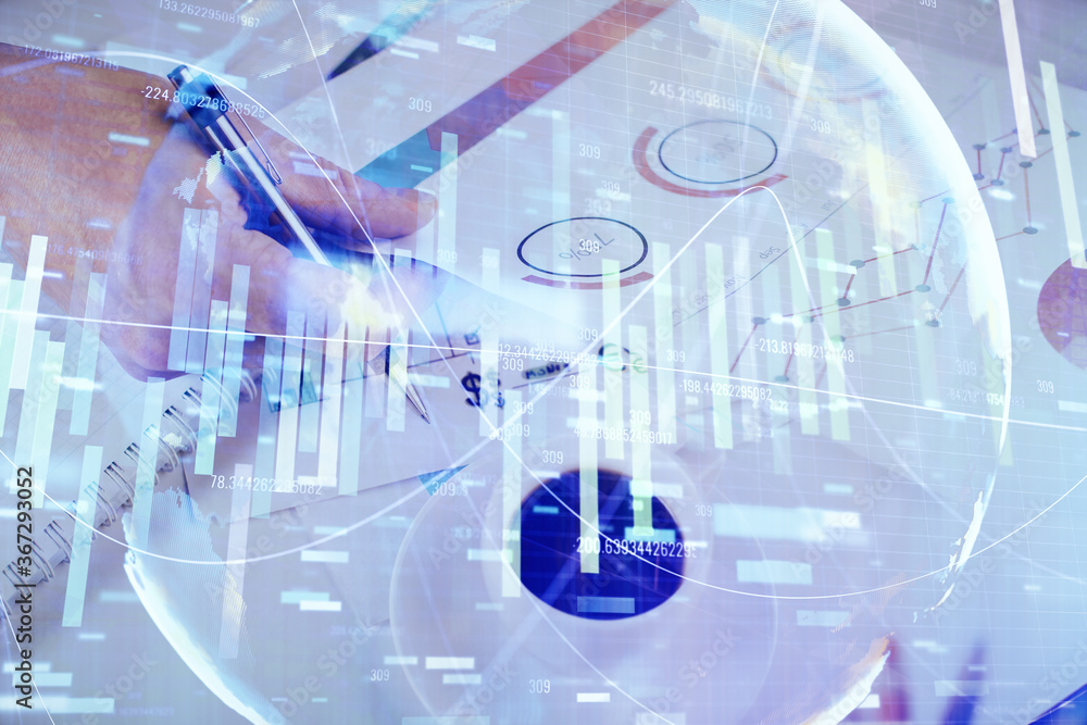 Double exposure of Man writing in notepad with business icons on background. Double exposure of Man writing in notepad with business icons on background.