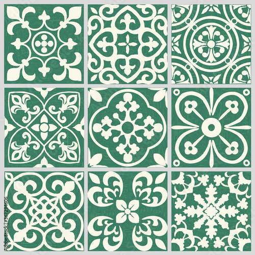 Patchwork texture from tiles in the oriental style in green and gray. Abstract background. Geometric ceramic design tile.