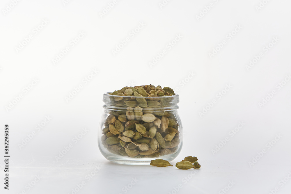 Cardamom shot on white background Cardamom shot on white background