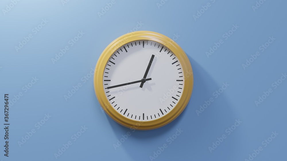 Glossy orange clock on a blue wall at forty-three past twelve. Time is 00:43 or 12:43 Glossy orange clock on a blue wall at forty-three past twelve. Time is 00:43 or 12:43