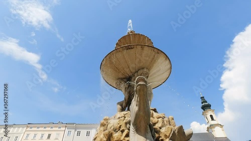 Fountain on Residenz square in the historic part of Salzburg, Austria