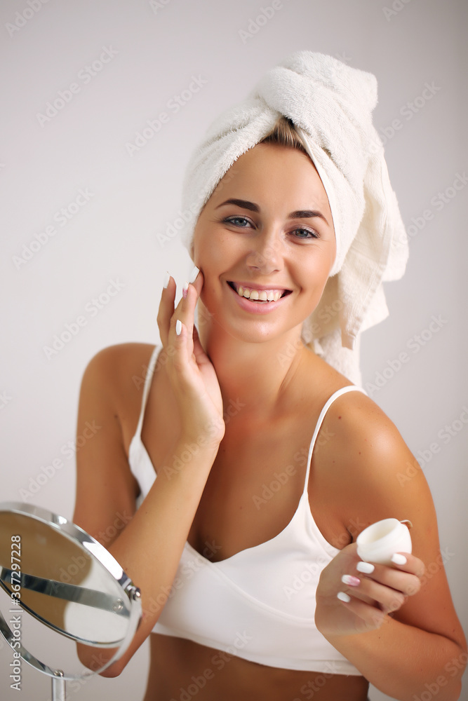 beauty and spa. Facial treatment. Cosmetology girl with clean fresh skin touching her own face beauty and spa. Facial treatment. Cosmetology girl with clean fresh skin touching her own face