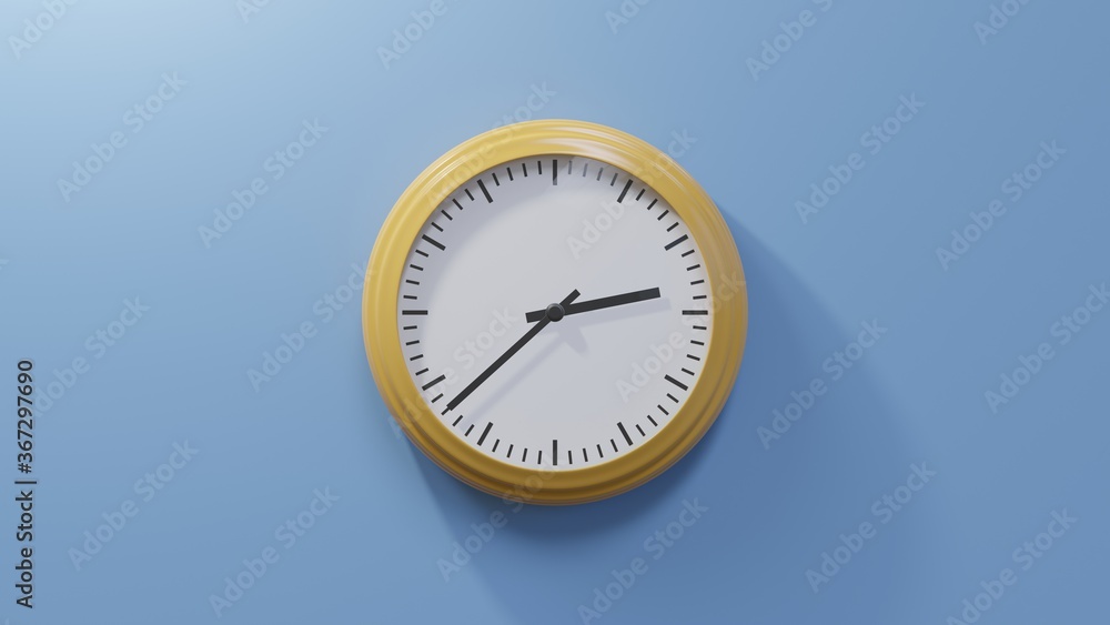 Glossy orange clock on a blue wall at thirty-eight past two. Time is 02:38 or 14:38 Glossy orange clock on a blue wall at thirty-eight past two. Time is 02:38 or 14:38