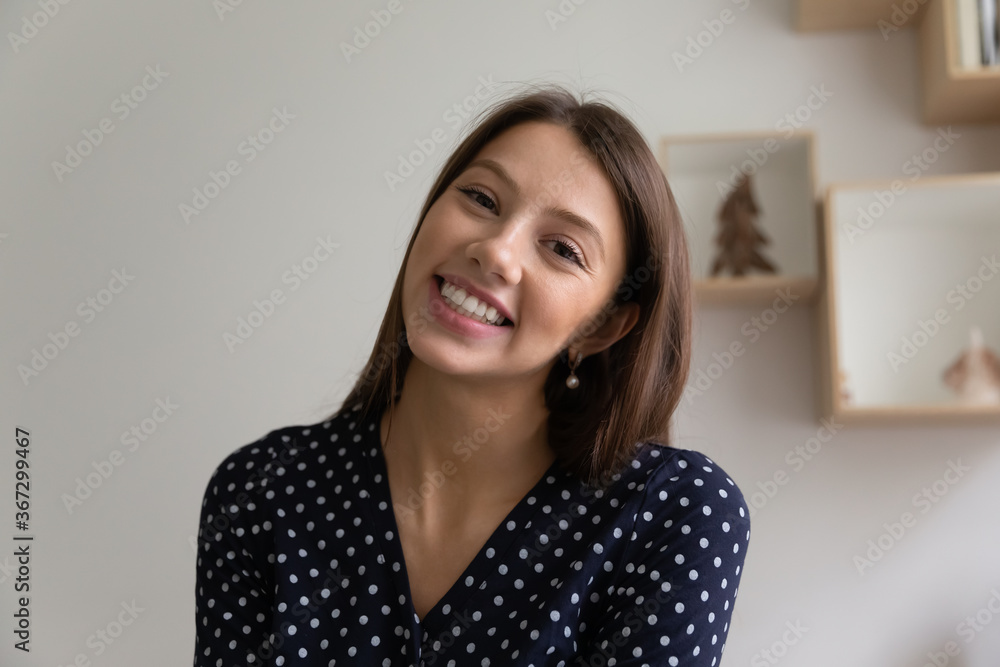 Headshot close up portrait of smiling millennial Caucasian girl talk speak online on video call at home, happy young woman have webcam conversation or virtual event, web communication concept Headshot close up portrait of smiling millennial Caucasian girl talk speak online on video call at home, happy young woman have webcam conversation or virtual event, web communication concept