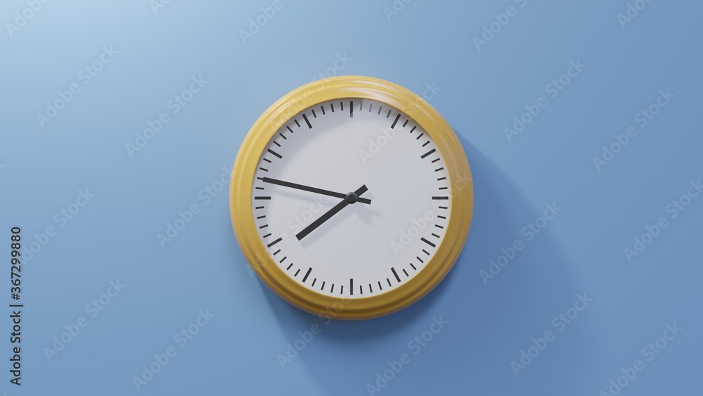 Glossy orange clock on a blue wall at forty-seven past seven. Time is 07:47 or 19:47 Glossy orange clock on a blue wall at forty-seven past seven. Time is 07:47 or 19:47