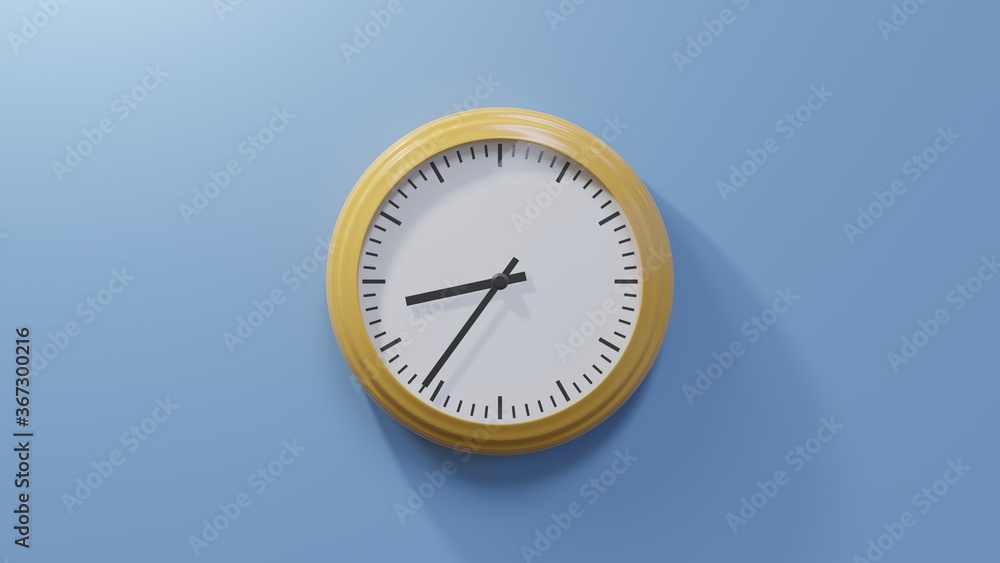 Glossy orange clock on a blue wall at thirty-six past eight. Time is 08:36 or 20:36 Glossy orange clock on a blue wall at thirty-six past eight. Time is 08:36 or 20:36