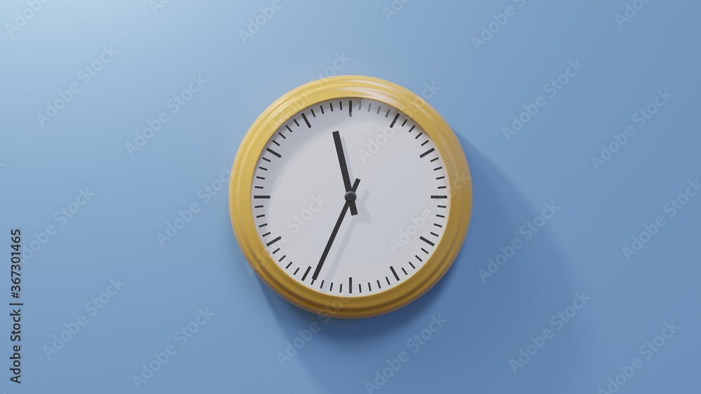 Glossy orange clock on a blue wall at thirty-four past eleven. Time is 11:34 or 23:34 Glossy orange clock on a blue wall at thirty-four past eleven. Time is 11:34 or 23:34