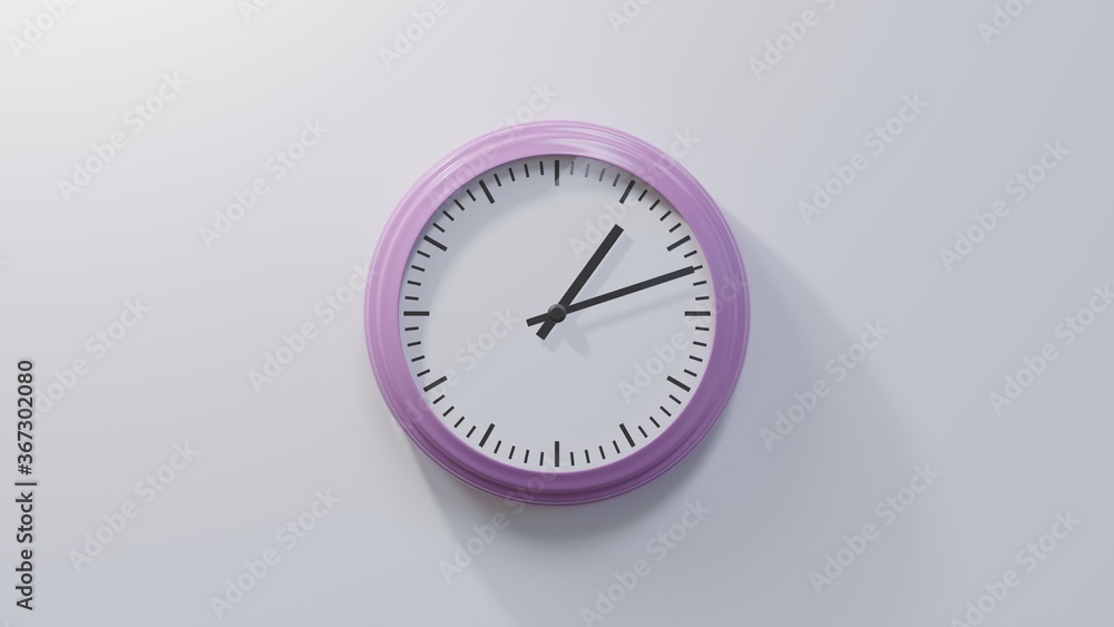 Glossy pink clock on a white wall at twelve past one. Time is 01:12 or 13:12 Glossy pink clock on a white wall at twelve past one. Time is 01:12 or 13:12