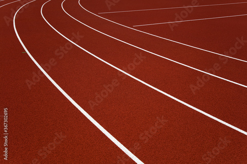 Red stadium running tracks closeup