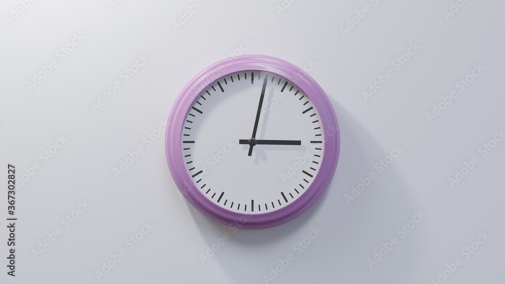 Glossy pink clock on a white wall at two past three. Time is 03:02 or 15:02 Glossy pink clock on a white wall at two past three. Time is 03:02 or 15:02