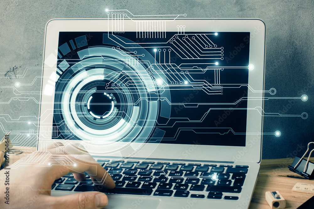 Double exposure of data internet theme hologram with man working on computer on background. Concept of innovation.