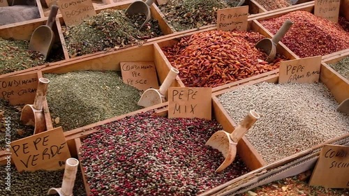 Wide variety of typical italian spices on a street market stall in Sicily, Italy photo