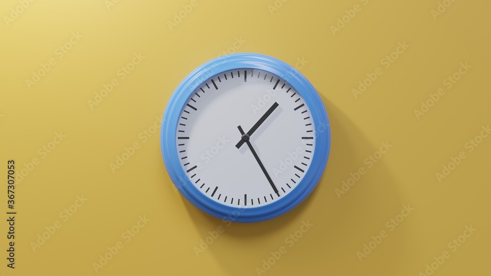 Glossy blue clock on a orange wall at twenty-five past one. Time is 01:25 or 13:25 Glossy blue clock on a orange wall at twenty-five past one. Time is 01:25 or 13:25