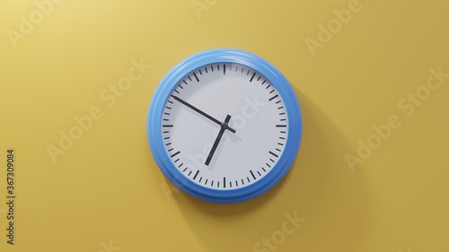 Glossy blue clock on a orange wall at ten to seven. Time is 06:50 or 18:50