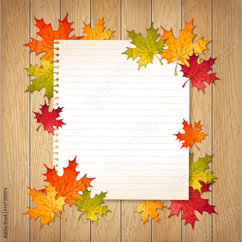 Vector autumn illustration with colorful maple leaves and notebook paper page on wooden table background