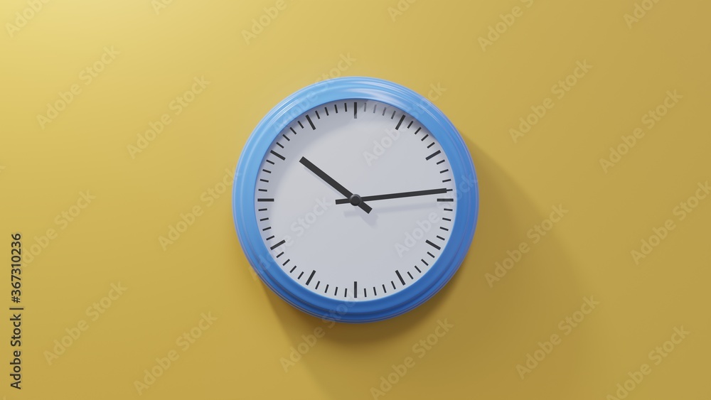 Glossy blue clock on a orange wall at fourteen past ten. Time is 10:14 or 22:14 Glossy blue clock on a orange wall at fourteen past ten. Time is 10:14 or 22:14