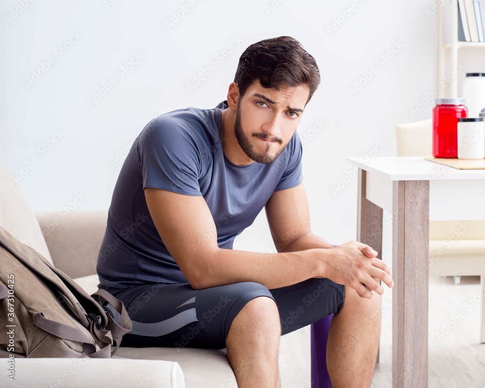 Young man getting ready for gym sports Young man getting ready for gym sports