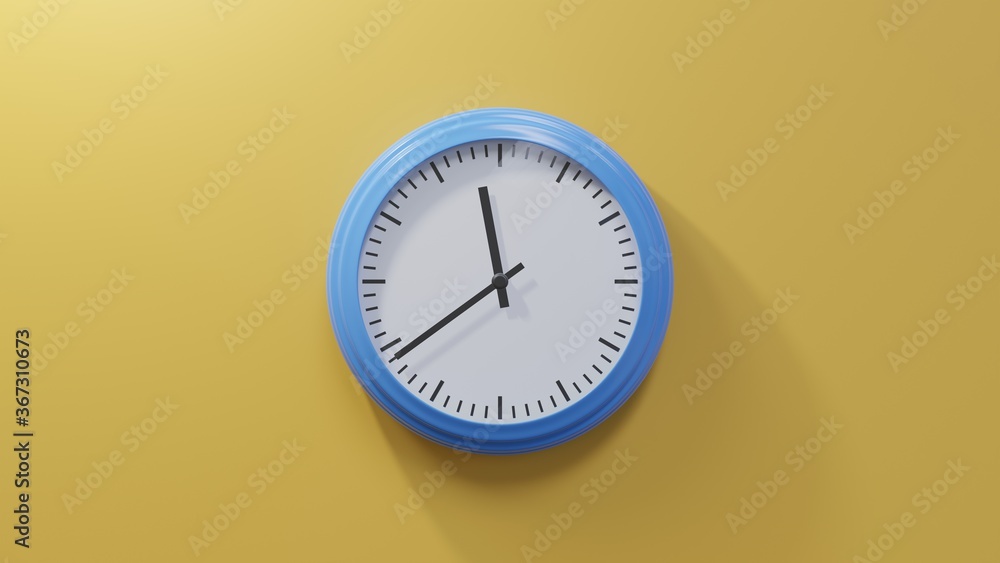 Glossy blue clock on a orange wall at thirty-nine past eleven. Time is 11:39 or 23:39 Glossy blue clock on a orange wall at thirty-nine past eleven. Time is 11:39 or 23:39
