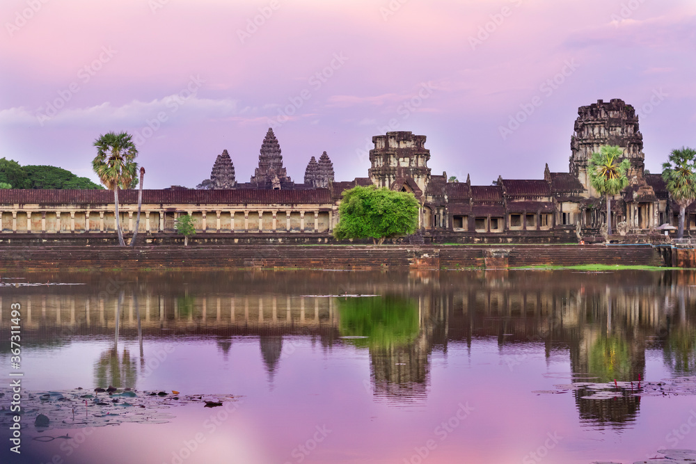 Part of the Angkor wat temple reflecting in the lake by sunset in Siem Reap, Cambodia.