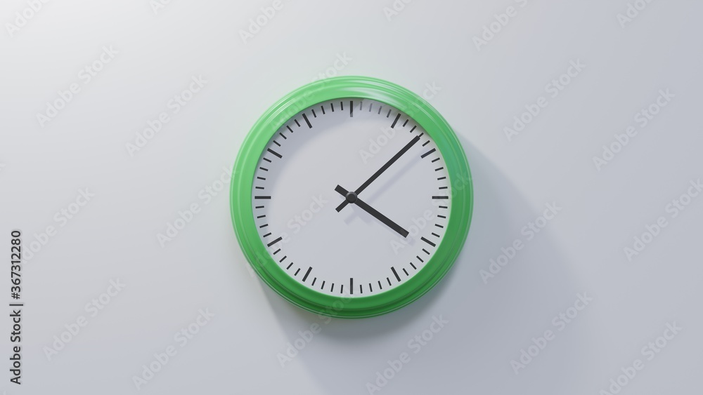 Glossy green clock on a white wall at eight past four. Time is 04:08 or 16:08 Glossy green clock on a white wall at eight past four. Time is 04:08 or 16:08