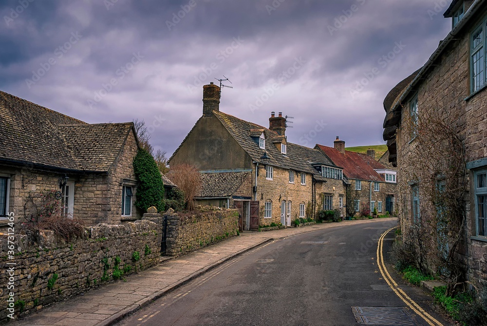 A row of old houses in a village in Dorset, UK