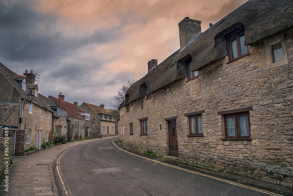 A row of old houses in a village in Dorset, UK