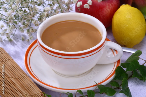 Close up of a cup of Hong Kong style milk tea with fruits