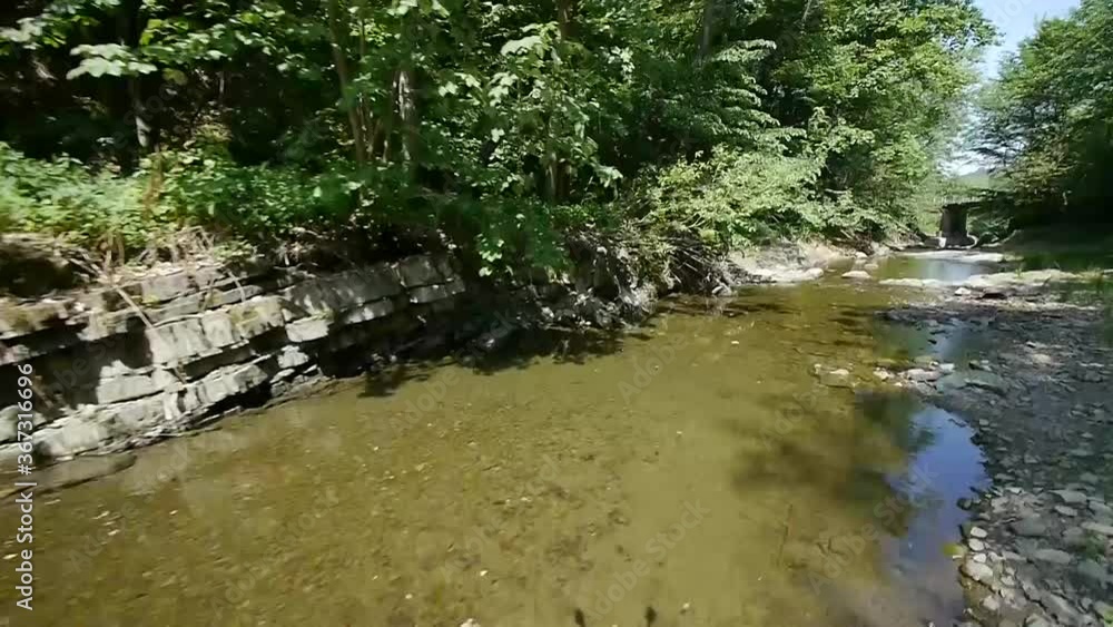 Drone Low view Along a Beautiful Rocky Stream In Poland Drone Low view Along a Beautiful Rocky Stream In Poland