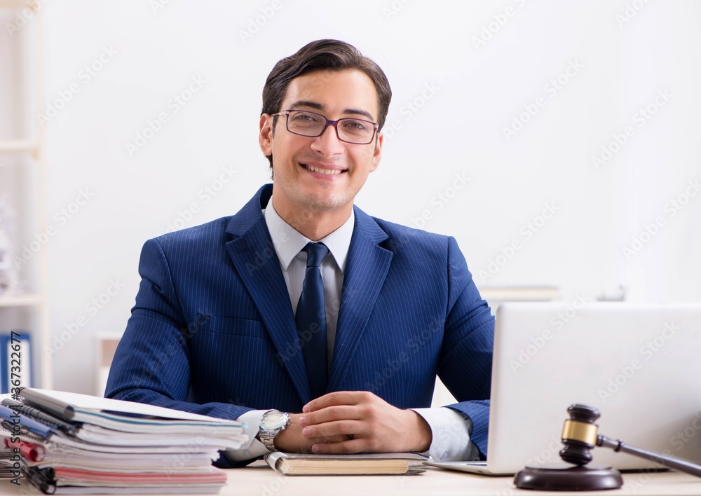 Young handsome judge working in court Young handsome judge working in court