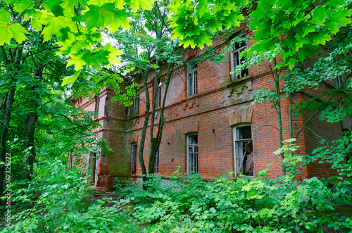 Abandoned school building in resettled village of Babchin in exclusion zone of Chernobyl nuclear power plant, Belarus