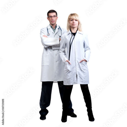 Man and woman in white coats of doctors with stethoscopes on a white background in isolation
