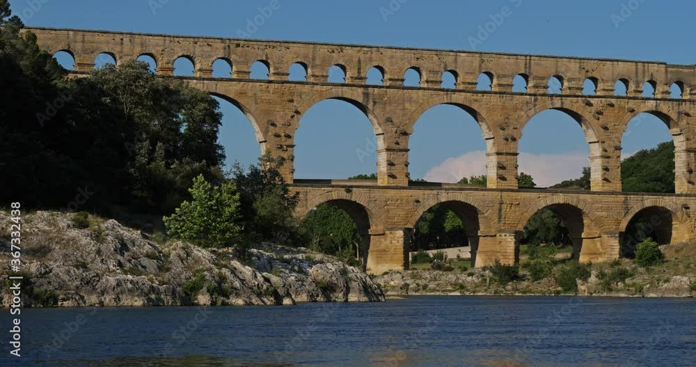 The Roman Bridge Pont du Gard and the Gardon River,Resmoulin, Gard, Occitanie,France The Roman Bridge Pont du Gard and the Gardon River,Resmoulin, Gard, Occitanie,France