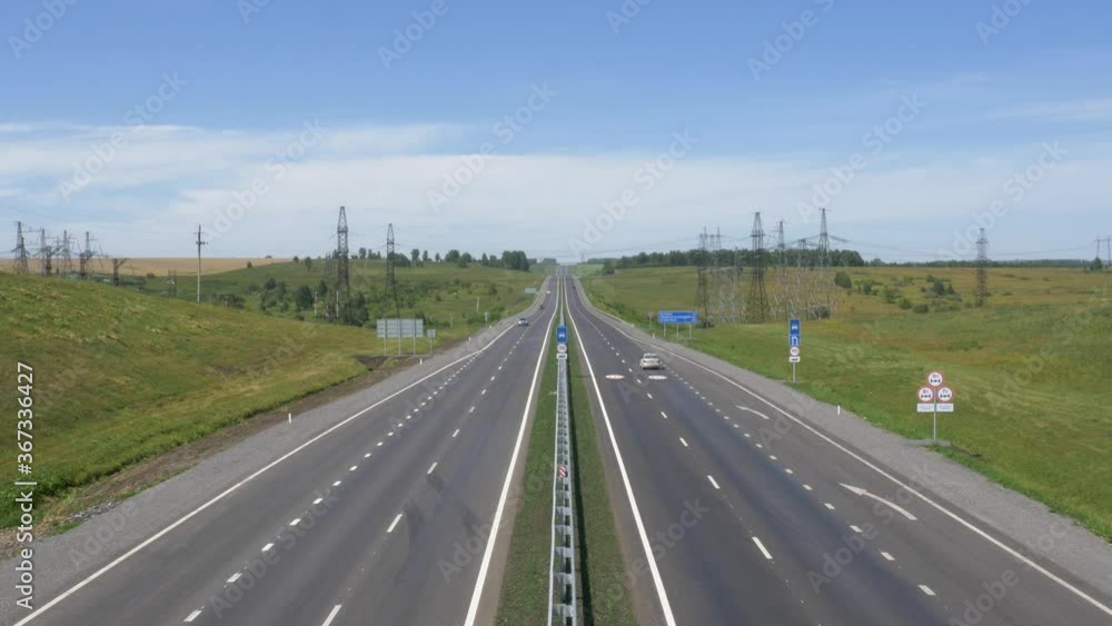 The road stretches beyond the horizon, the movement of vehicles. The road stretches beyond the horizon, the movement of vehicles.