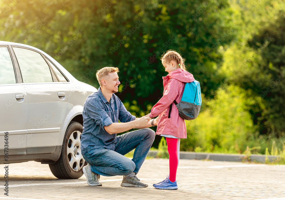 Father meeting little girl after classes Father meeting little girl after classes