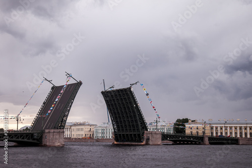 St. Petersburg, Russia - July, 2020: Day of Navy of Russia. Naval parade. Military destroyers on Neva river. Bridges Saint Petersburg. Holidays of Russia. Petersburg embankments. Rehearsal of parade