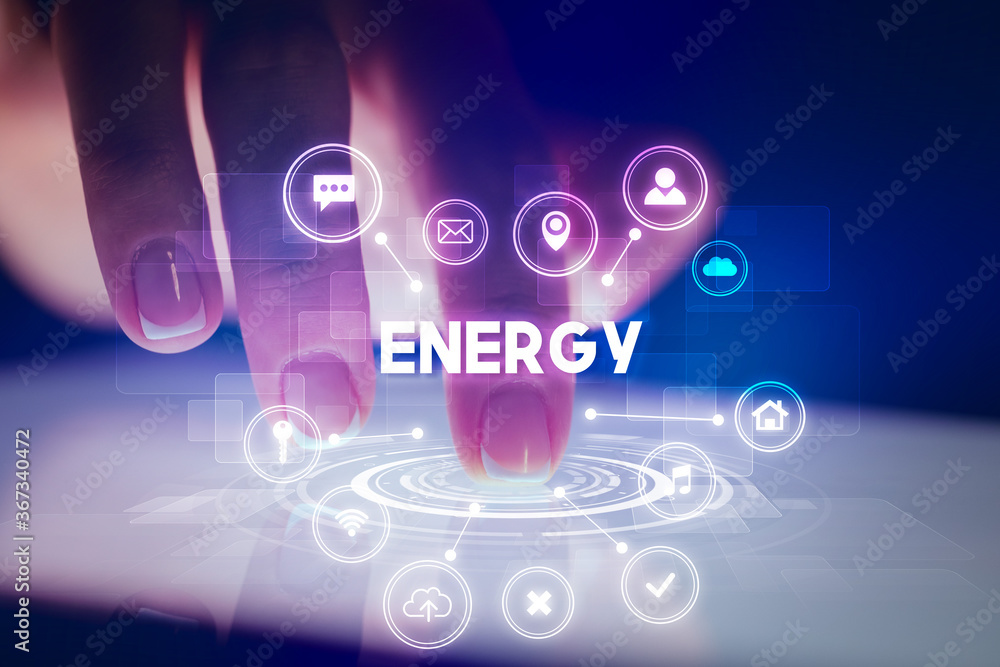 Finger touching tablet with web technology icons and ENERGY inscription, web technology concept