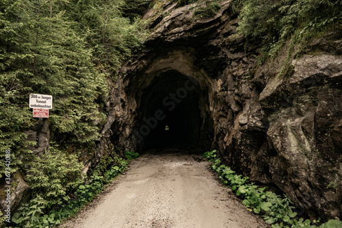 Fototapeta Naklejka Na Ścianę i Meble -  long dark tunnel in the mountains
