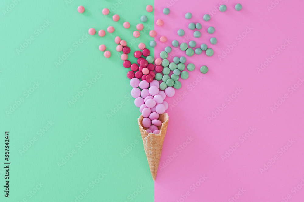 Flat lay style sweet treat food concept photo using complementary colours palette of pink and green. Candy colours reversed against background. Copy space available Flat lay style sweet treat food concept photo using complementary colours palette of pink and green. Candy colours reversed against background. Copy space available