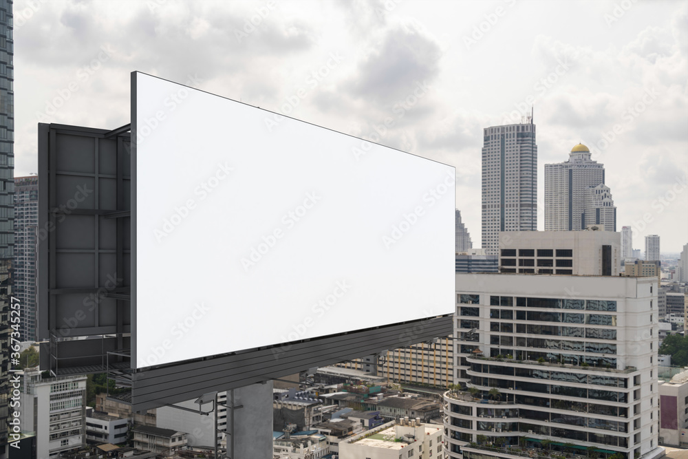 Blank white road billboard with Bangkok cityscape background at day time. Street advertising poster, mock up, 3D rendering. Side view. The concept of marketing communication to promote or sell idea. Blank white road billboard with Bangkok cityscape background at day time. Street advertising poster, mock up, 3D rendering. Side view. The concept of marketing communication to promote or sell idea.