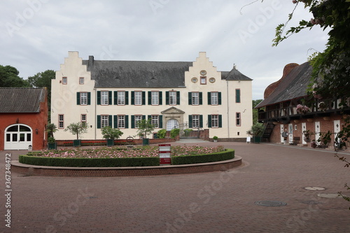 Heimerzheim, Nordrhein-Westfalen/ Germany - June 13 2020: Castle Heimerzheim - moated castle located in North Rhine-Westphalia, Germany