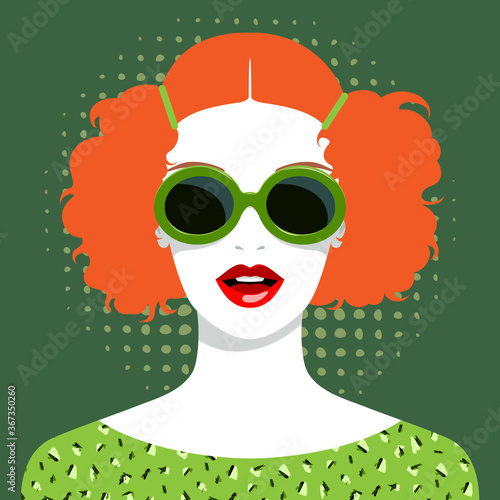 Beautiful redhead woman with sunglasses