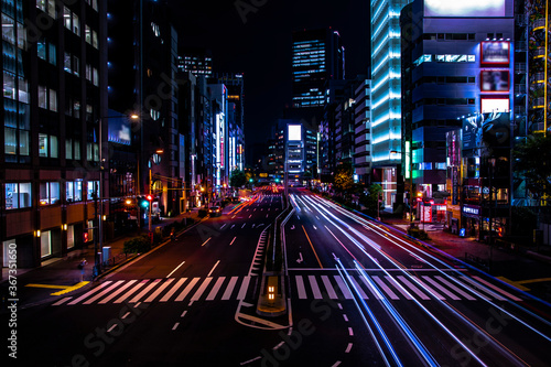 A night urban city street in Aoyama wide shot