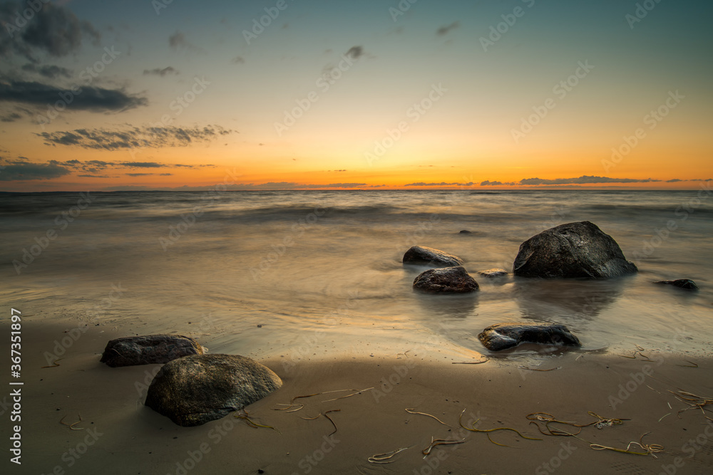 Fototapeta premium Sunset by the sea. Nature and nature landscape at sunset.