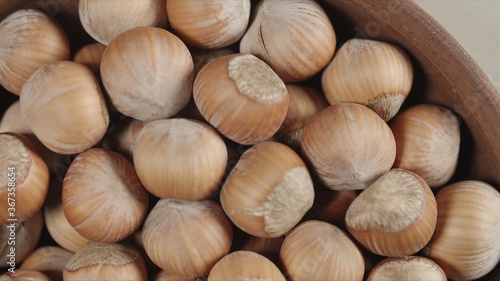 Hazelnut closeup in wooden bowl