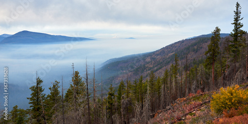 Foggy panoramic view from Green Ridge Lookout in Central Oregon with Mt Hood at background.