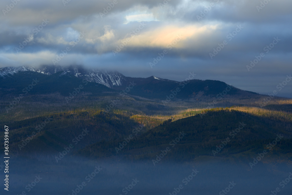 Impressive cloudy mountain landscape at sunrise.  View from Green Ridge Lookout in Central Oregon.